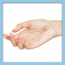 Image of a hand with a bandage applied to indicate post-surgery recovery